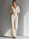 Alia | Mono Chic con Top Cruzado y Pantalones Amplios