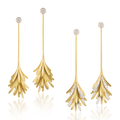 "Pendientes de Candelabro Skin" can be rewritten as "Pendientes Skin en Forma de Candelabro".